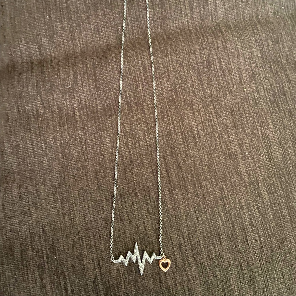 Silver EKG necklace, gold heart.